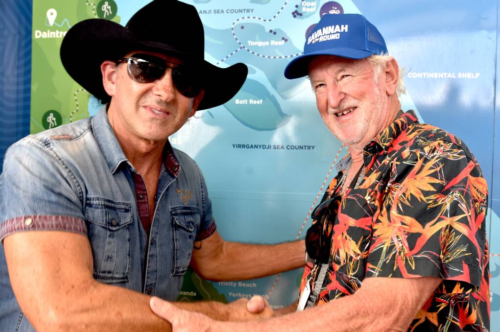 Country music star Lee Kernaghan (left) with Craig Thornton who raised $1.6 million for Surfers Paradise SLSC and is campaigning for more accessibility on beaches. Picture supplied