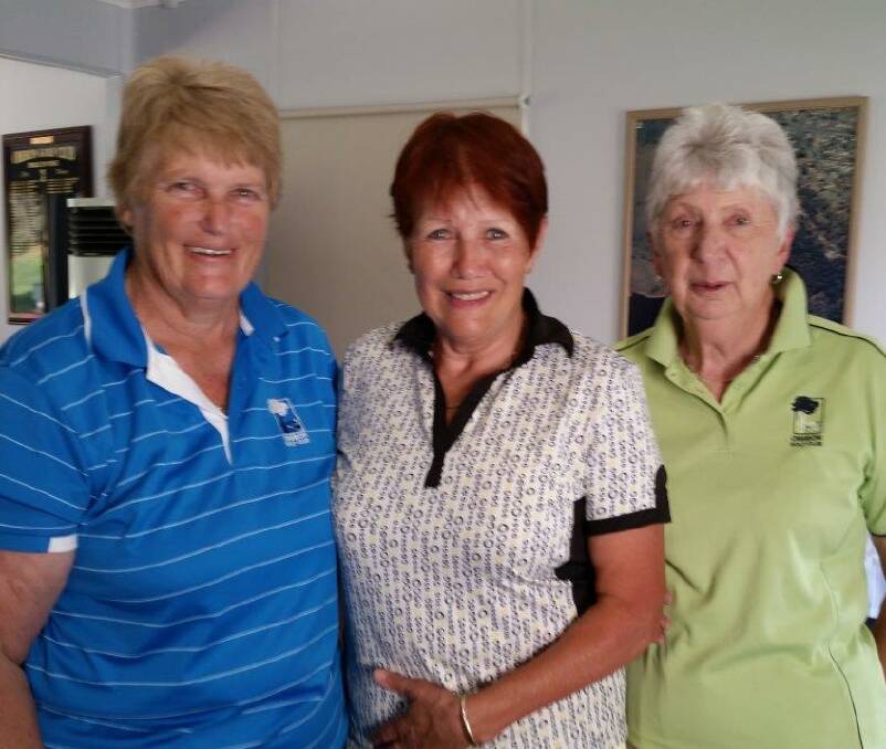 ON COURSE: Robyn Slattery, who won A grade in the Club Championships, with Irene Bishop and Joan Graham.