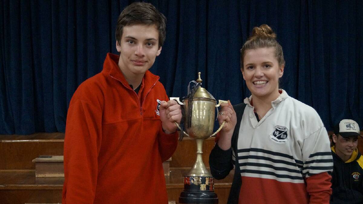 OURS FOR THE KEEPING: School leaders Emmett Bowman and Jess Maclure with the Rural Cup, which Oberon High has retained for the fourth year in a row.
