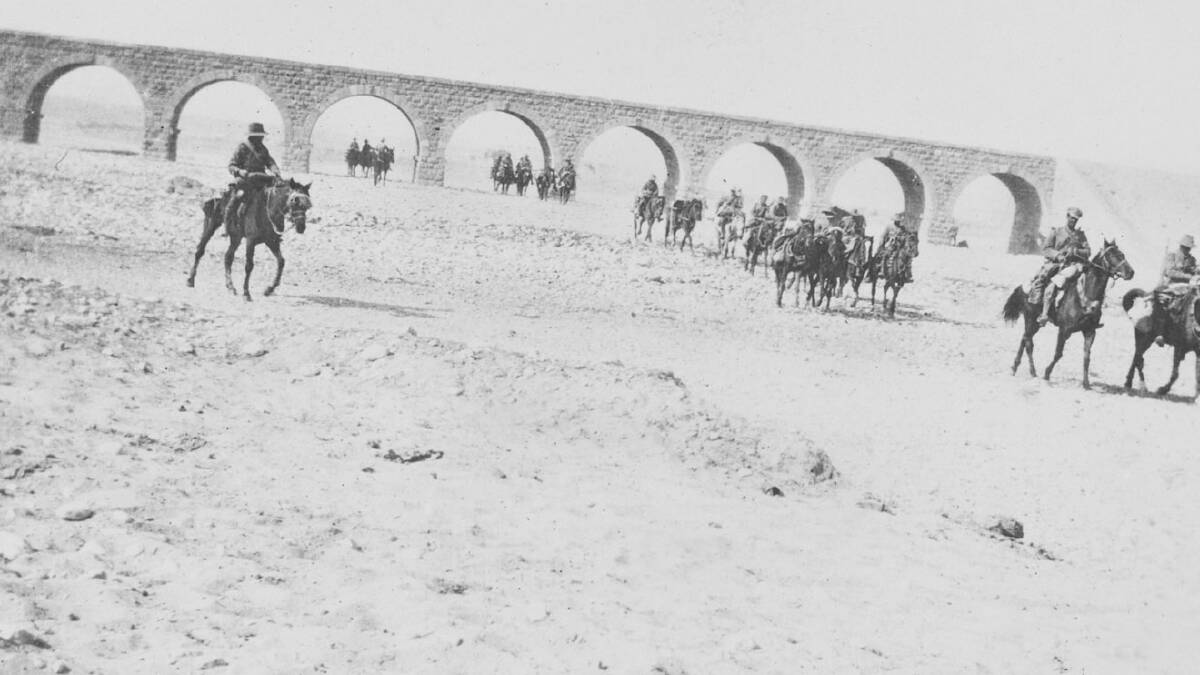 HISTORY: Mounted troopers and Beersheba’s railway bridge. High school students are being given the chance to travel to Israel. IMAGE: Australian War Memorial.