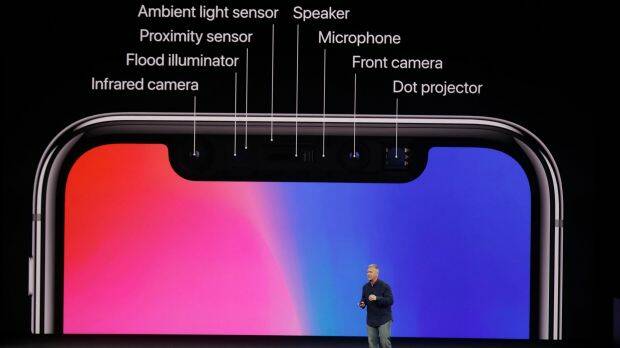 The top cut-out of the iPhone X screen houses an array of sensors. Photo: AP
