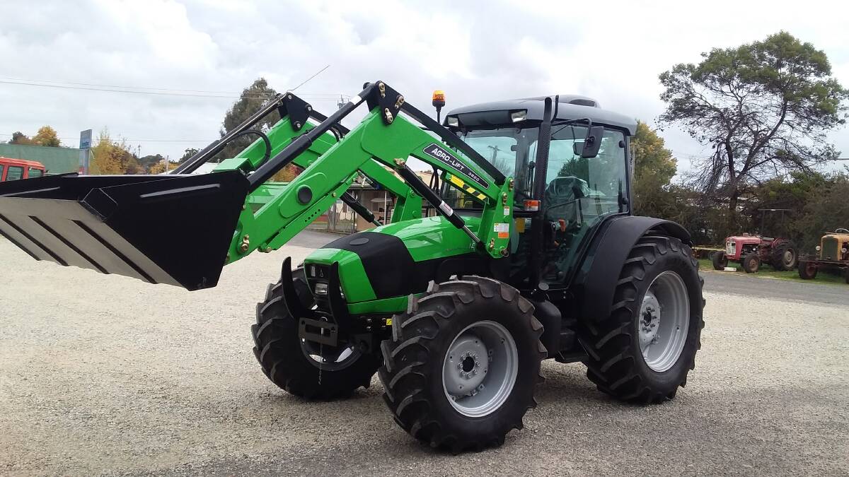 BIG BOY'S TOY: This 100hp four wheel drive tractor retails for about $84,000 with its four-in-one loader. Buyers are urged to discuss tax incentives that may be available.