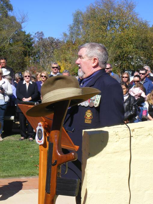 SOMBRE: Oberon RSL Sub Branch president Bill Wilcox at last year's morning service after the main street march from Oberon Council Chambers.