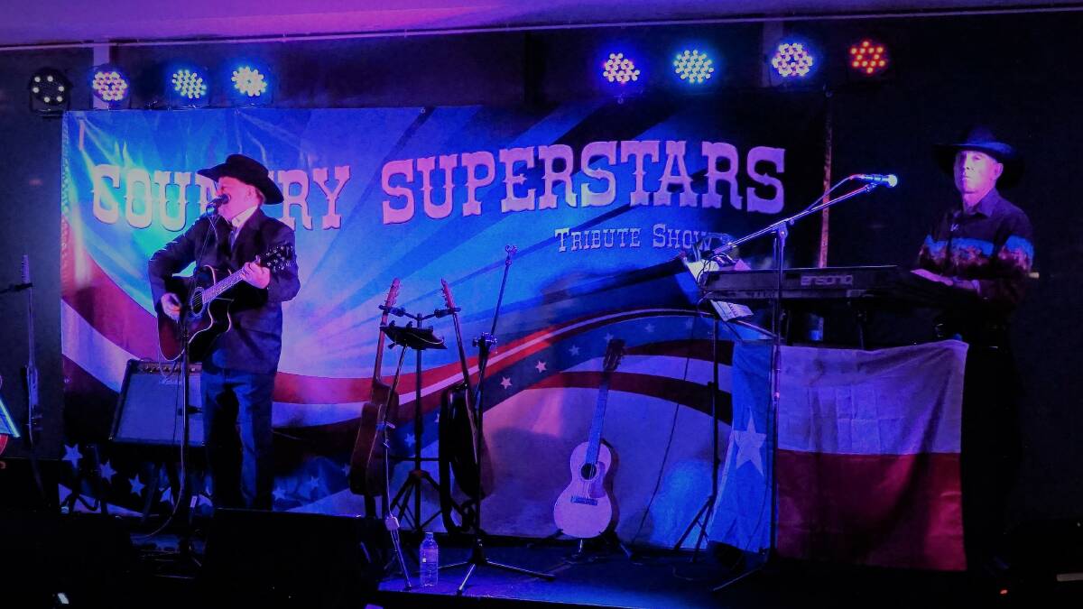 A LITTLE BIT COUNTRY: Country Superstars Tribute Show's Steve Taylor performing in the role of Johnny Cash.