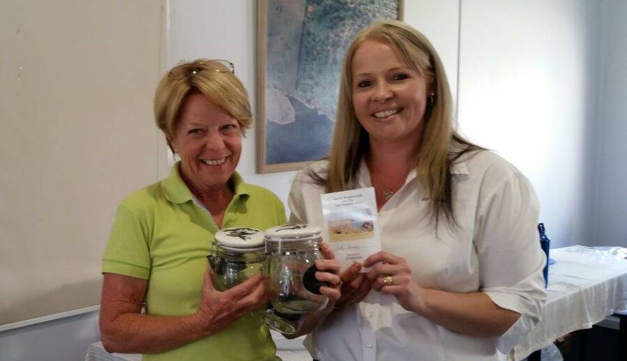 SMILES: Division 3 stableford winner Kathy Mooney with Jess Foley from Ray White Emms Mooney, which was the women's golf open day major sponsor.