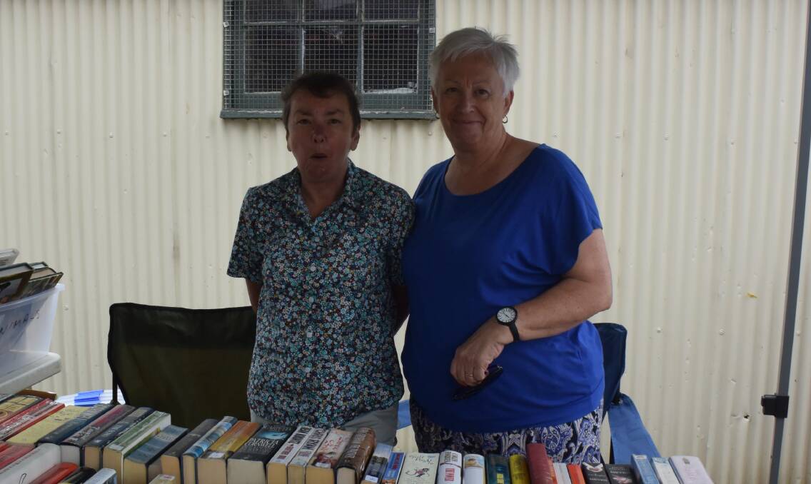 NEW CHAPTER: Friends of the Oberon Library members Lyndle Hawks and Kathy Sajowitz at their book stall.