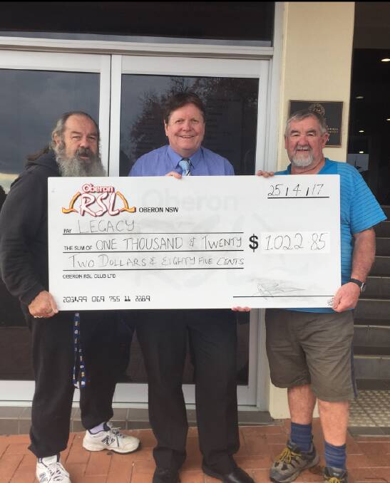 DONATION: RSL Club manager Peter Price presents a cheque to Oberon RSL Sub Branch members Neville Stapleton and Bill Wilcox.