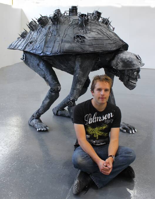 JUDGE: Artist Tom Buckland, pictured with his work Mammalian Locomotion, is a judge at the Waste to Art competition.