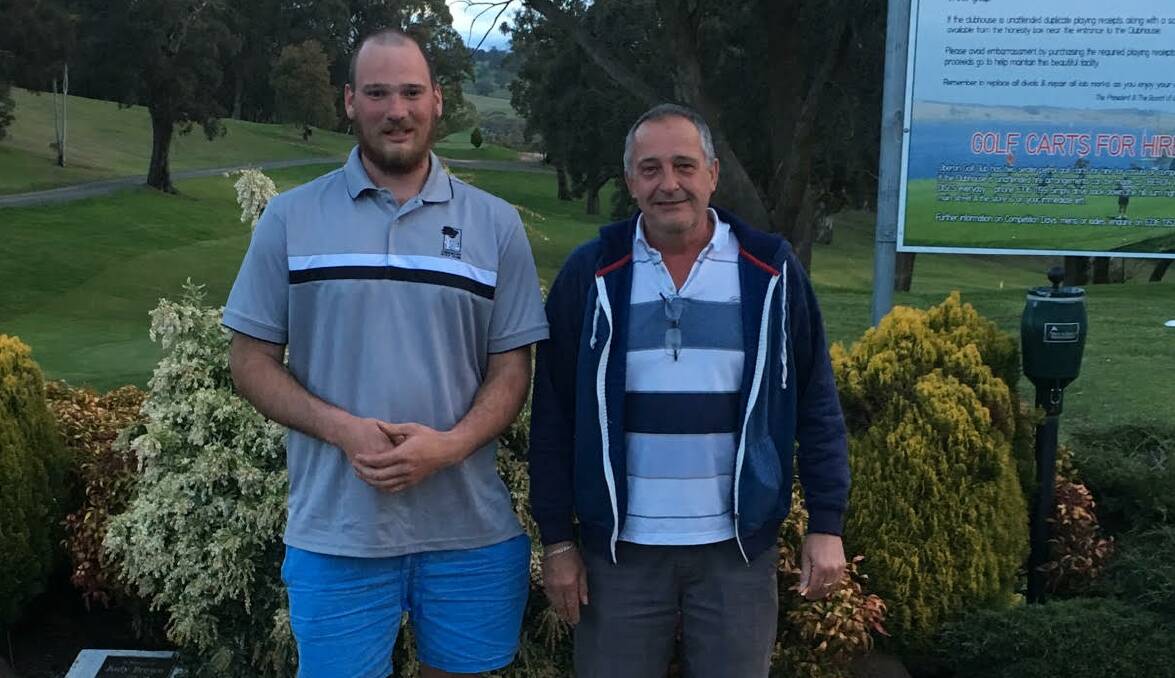 VICTOR: B grade winner Chad Drury and Peter Brien visiting Oberon over the weekend. The weather hasn't been kind to golfers recently.