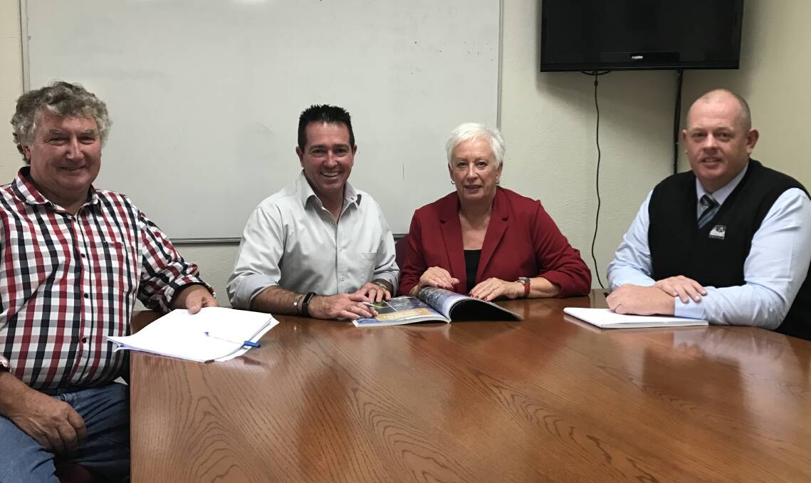 MEETING: Cr Clive McCarthy, Member for Bathurst Paul Toole, mayor Kathy Sajowitz and council general manager Gary Wallace at the announcement of an innovation grant.