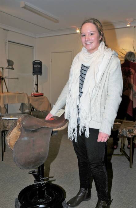CREATIVE: Brooke Stanton, pictured with a Saddle Rider seat, was one of the many entrants in the Waste to Art Exhibition.