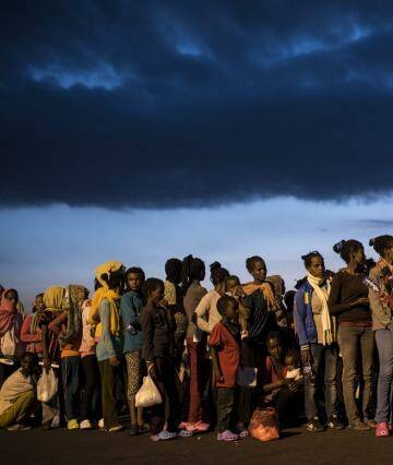 Human cargo: Hundreds of migrants from sub-Saharan Africa arrive in Sicily in September. Photo: New York Times