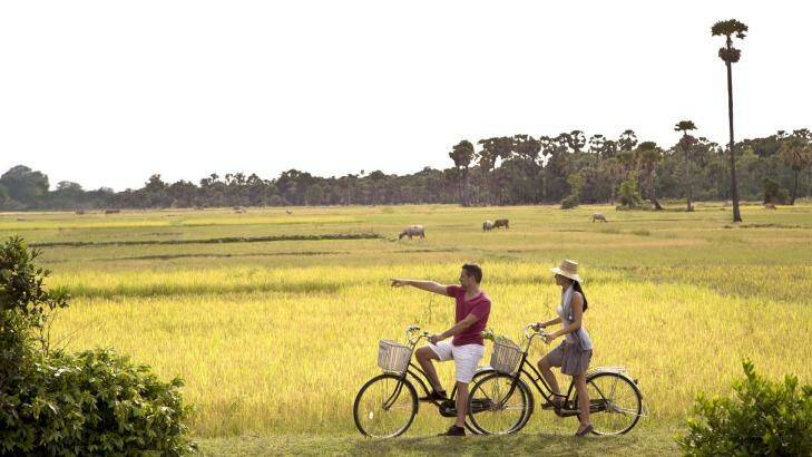Cycling, Angkor Wat, Cambodia. Photo: Claudio Cerquetti