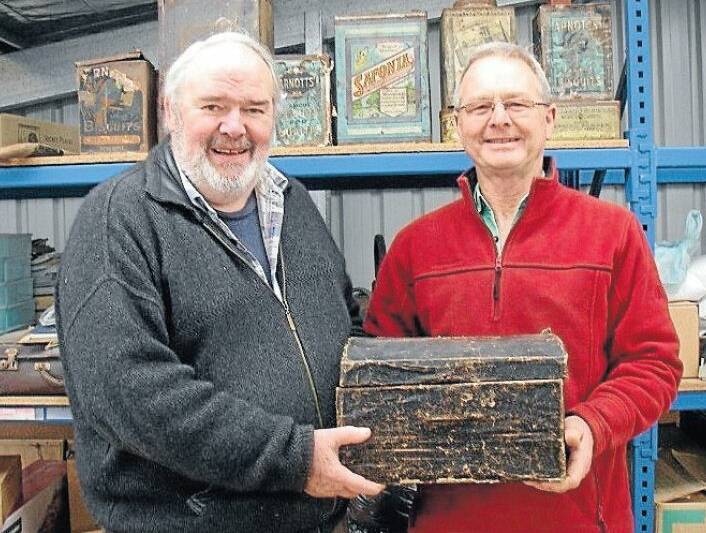 PRECIOUS: David Gregory and Col Roberts with the chest the 13-year-old
Hugh Kelly brought with him from Ireland in 1854.