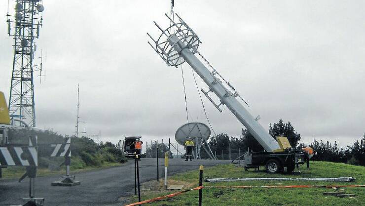 GOING UP: The first NBN fixed wireless tower was erected last week at Oberon Lookout.