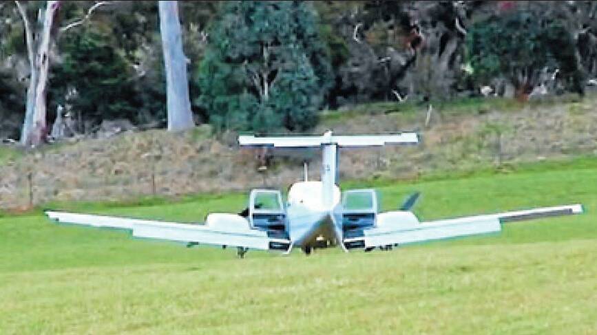 ON FIRM GROUND: A 23-year-old pilot  had to make an emergency landing after his passenger allegedly tried to take over the plane.