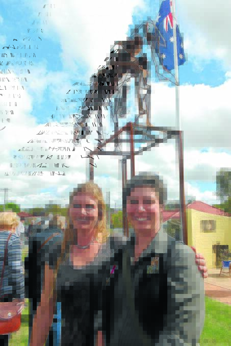 CREATIVE: Studio assistant Nicole O’Regan and artist Harrie Fasher with The Light Horse sculpture at the Oberon RSL Sub Branch Military Museum.