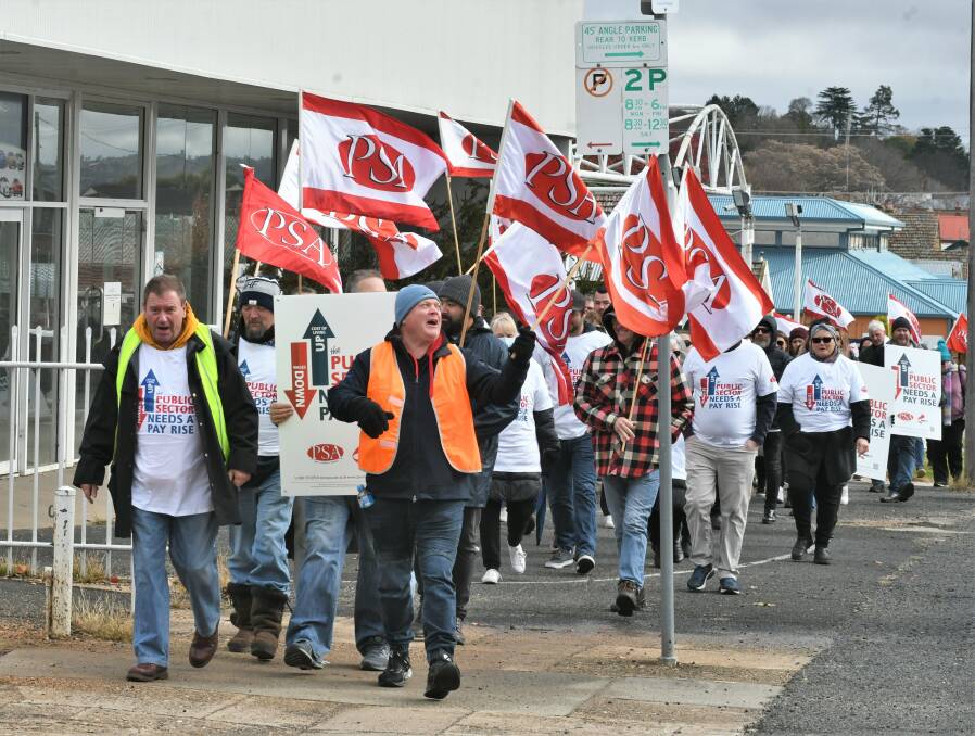 STRIKE: Bathurst PSA members marching for the salary cap to be removed. Photo: CHRIS SEABROOK.
