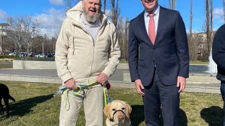 Terry Greaves and dog Nelson with veterans affairs minister Matt Keogh. Picture: Department of Veterans Affairs