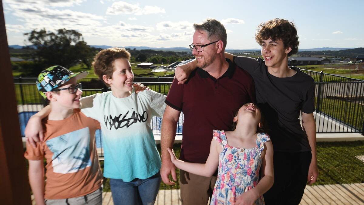 Llewellyn Owens, a self-described leader in the clean energy transition, with his children, from left, Quentin, Jocelyn, Felicity and Xavier. Picture by Gareth Gardner