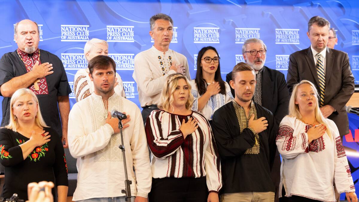 In an unusual move, the ambassador's address began with a rendition of the Ukrainian national anthem. Picture: Sitthixay Ditthavong