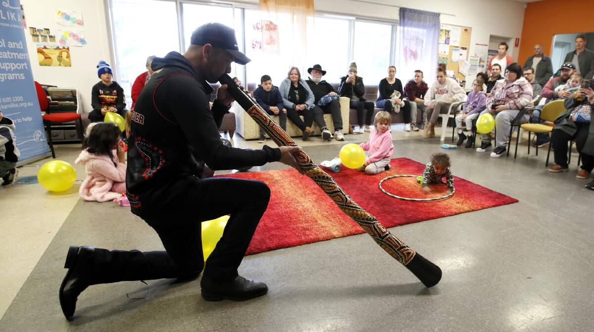 James Evans kicked off today's opening ceremony by playing the didgeridoo. Picture: Les Smith 