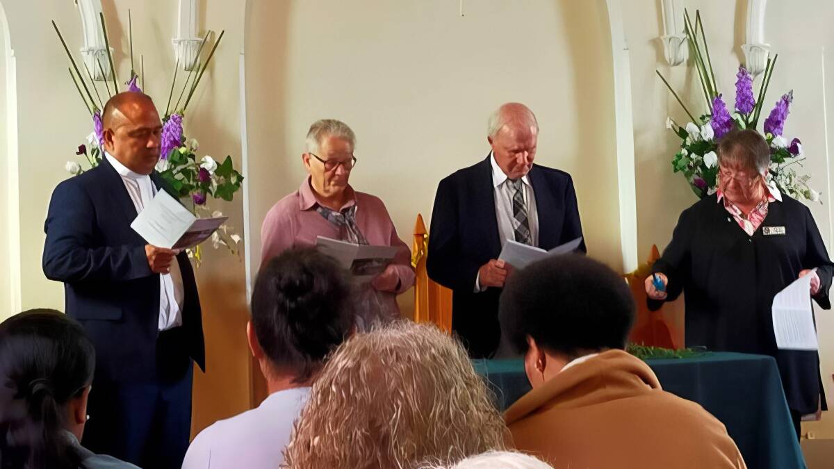 The lighting of Thanksgiving and Remembrance Candles: Rev Oto Faiva, Janet Clayton, Ian Gordon and Christine Stapleton. Photo supplied