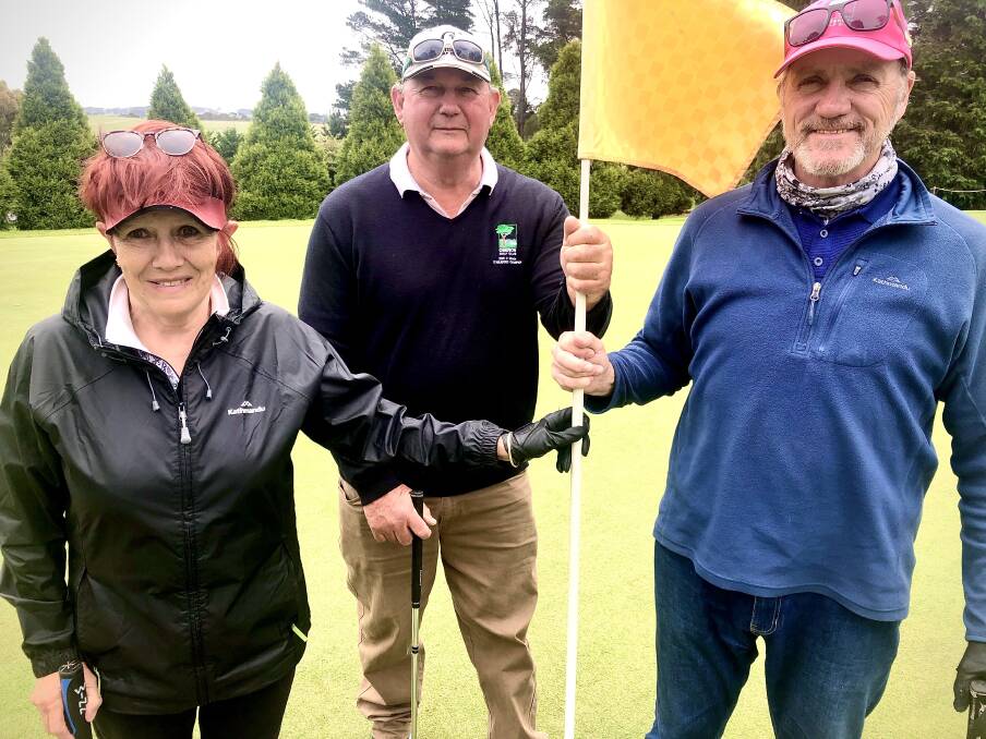 Saturday's winners Phil Cummings (centre), Irene Bishop and Alan Cairney. Picture: Supplied