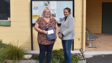 Michelle Swann, BSCA Secretary, and Oberon Councillor Helen Hayden outside the Black Springs Community Hall.