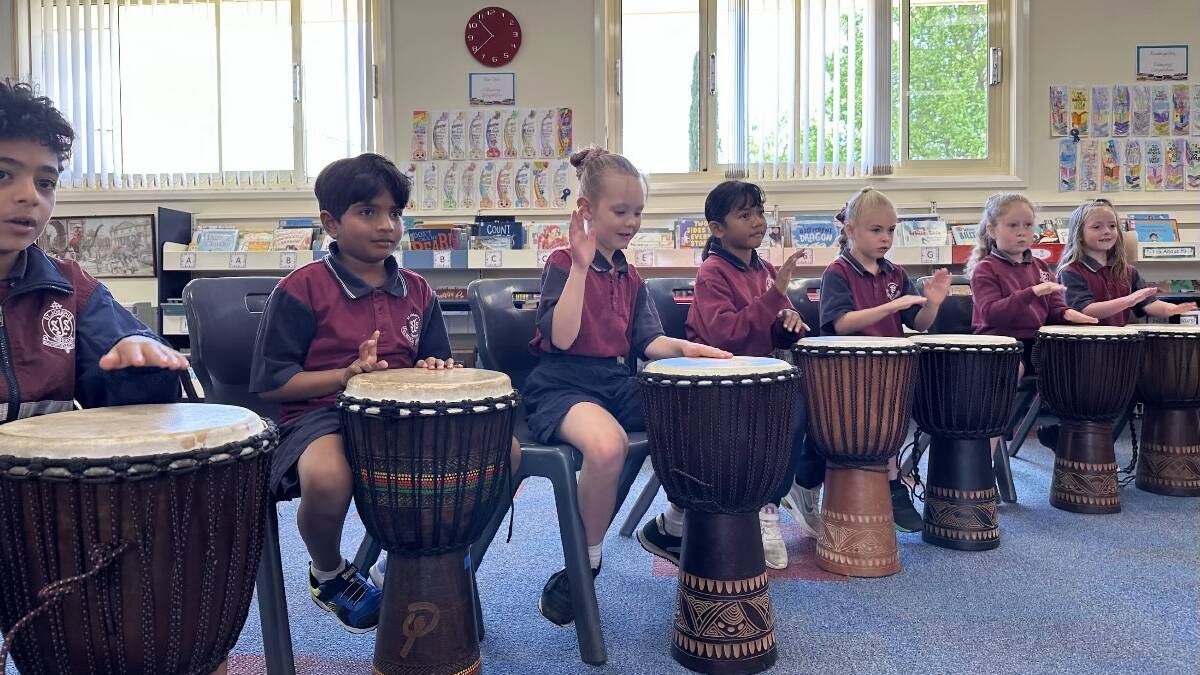 Students enthusiastic about learning African Drumming techniques. Picture supplied
