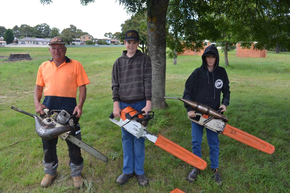 GEAR UP: Chainsaw steward Shane Ryan with his grandsons Zeb and Lang. Picture: CIARA BASTOW 