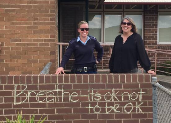 MENTAL HEALTH MONTH: RHAMP coordinator Sonia Cox is promoting mental health month with the help of Oberon Council and local police officers. Photo: SUPPLIED 