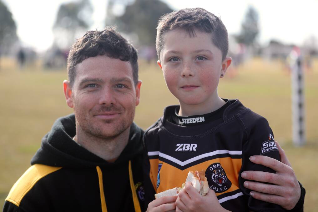 Oberon Junior Rugby League's Bill and Zaidyn Holmes at an Eglinton Eels' breast cancer fundraiser in Bathurst on July 23. Picture: Phil Blatch 