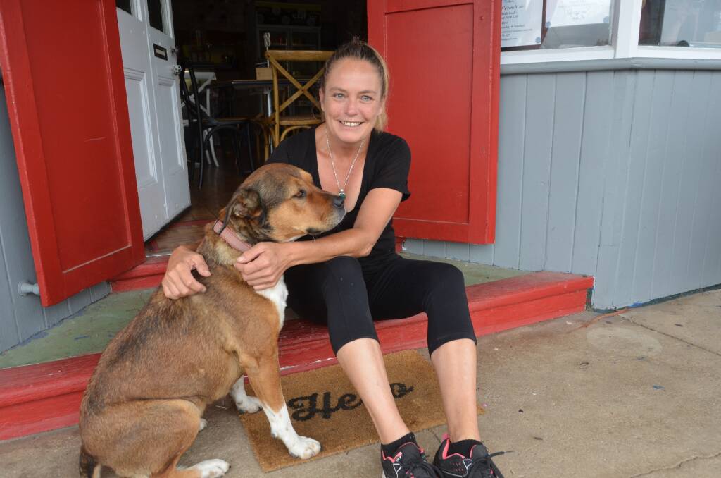GOODBYE: Tarana is preparing to lose its cafe the Universal Eatery. Chef Melissa Clear, pictured with her dog Ruby, who she says is a town mascot, will reopen the cafe in Oberon. Picture: PHOEBE MOLONEY