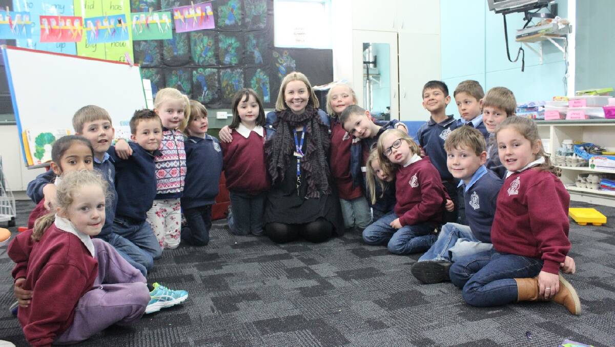 GOODBYE: Kindergarten teacher Samantha Fergus has been farewelled from St Joseph's as she prepares for the birth of her first child