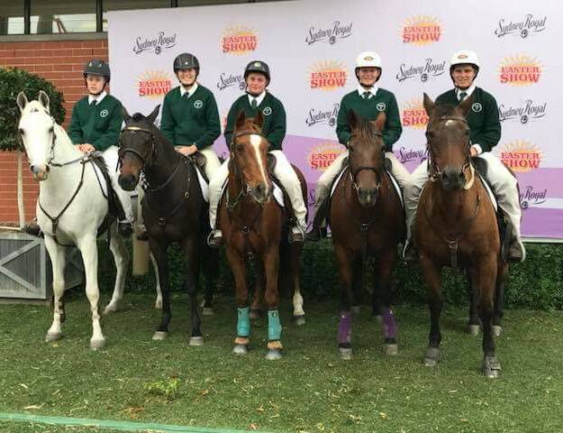 CHALLENGE: Madison Whitley (centre) on Tex with her team members who competed in the Combined Sporting event.