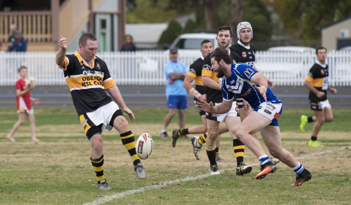 LEADER: Luke Branighan sends the ball long for the Oberon Tigers. Photo: ALEXANDER GRANT