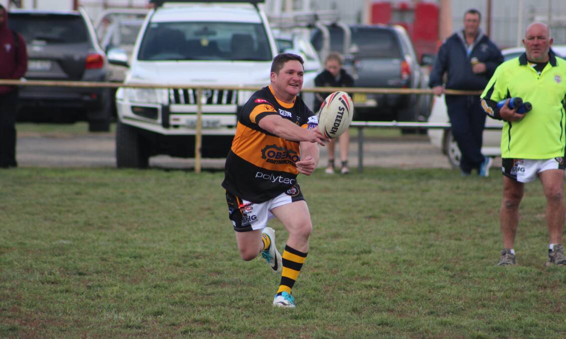 CHANGING SEASON: Oberon Tigers' Anton Wereta looks for support during Oberon's 40-0 defeat of the Blayney Bears earlier in the season. Photo: JESS RYAN