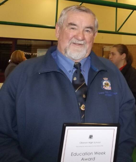 RECOGNISED: Bill Wilcox received a community award at a recent Oberon High School special assembly. Community members were part of the large audience.