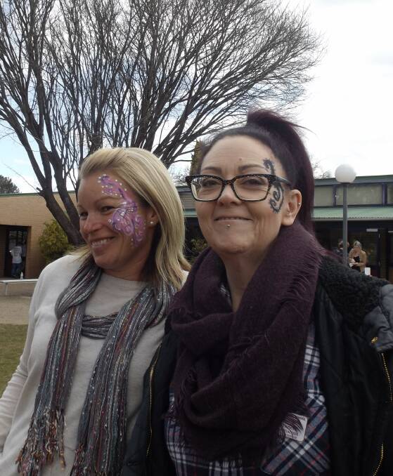 FACE IT: Kylee McGrath and Nicole Francis fresh from the face-painting fun during the special Hay Day.