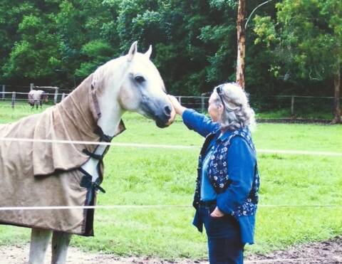 INSPIRATION: Janet Baljeu with Orlando, the horse who inspired her story The Wind Came Down The Chimney, which features in the Oberon Writers' Workshop anthology.