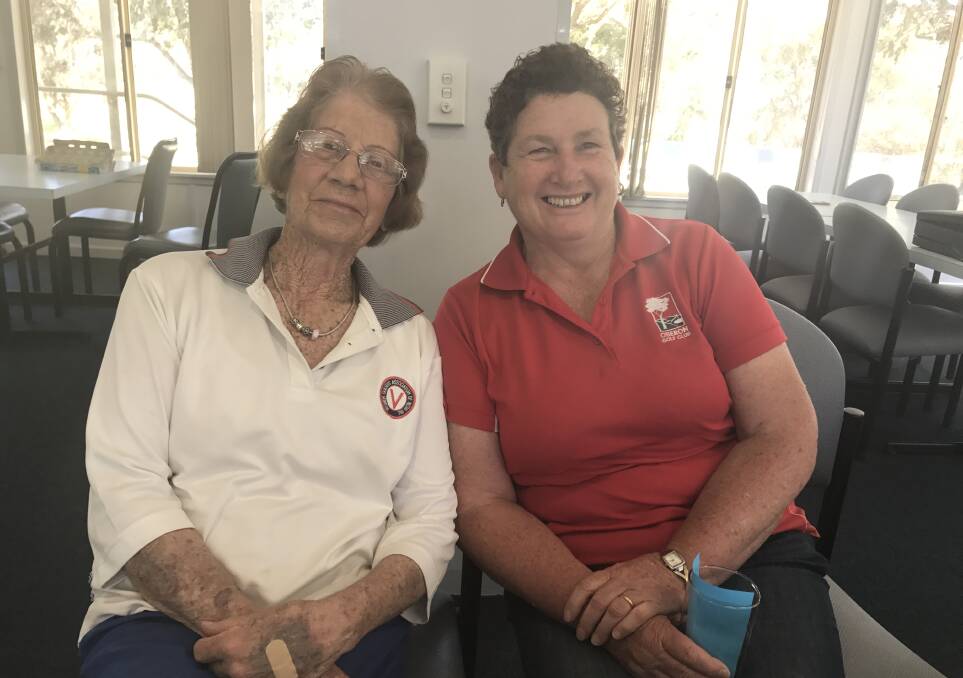 WELL DONE: Monthly Medal and Red Cross Cup winner, Glennie McGrath, with Vonda Voytilla, who won the putting competition.