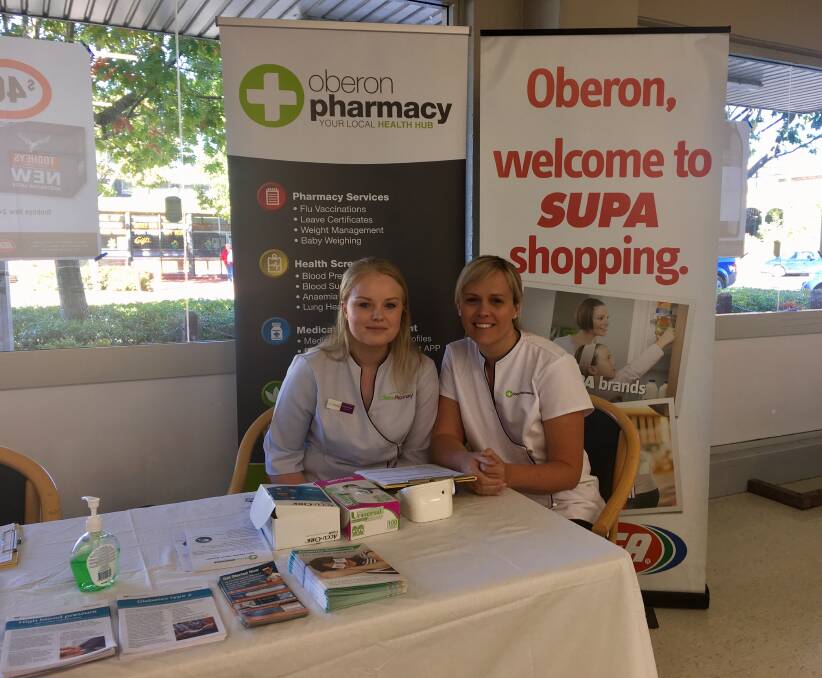HERE TO HELP: Dominica Koudrin and Jennifer Precians from Oberon Pharmacy manned a stand at Supa IGA.