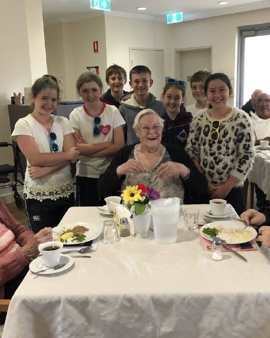 HAPPY: St Joseph’s School year six students were made to feel very welcome when they visited Columbia Aged Care recently. 