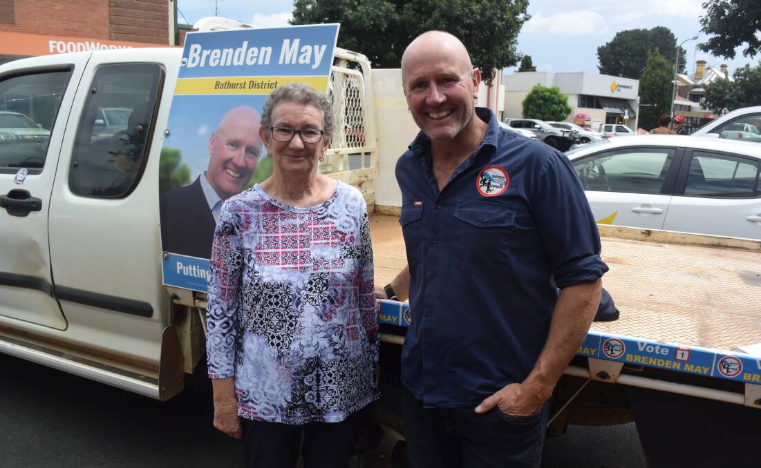 IN TOWN: Marj Armstrong chatting to Shooters, Fishers and Farmers Party candidate Brenden May when he was in Oberon last week.