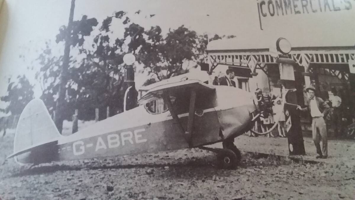 GRAND ENTRANCE: Arthur Butler landed this plane in the street in Tooraweenah, NSW when running low on fuel. His record flight from London to Sydney in 1931 took two hours off the old record.