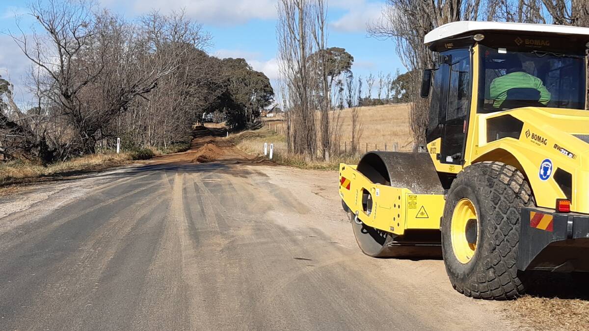 MAKING THE GRADE: Bathurst Regional Council staffers were busy grading a quiet rural road.