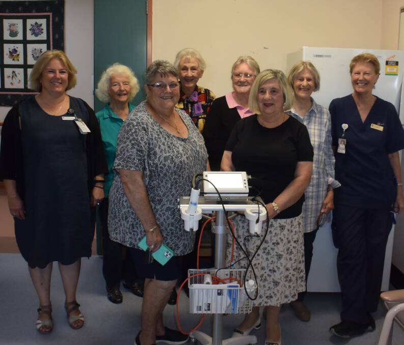 HELP: Oberon Hospital manager Alexandria Woods, Oberon Hospital Auxiliary members Margaret Farquarson, Jill Baxter, Lurline Ralls, Judy Haslop, Anabelle Gilbert and Jan Hazelwood and nurse manager Karen Mathews with a new bladder scanner presented recently.