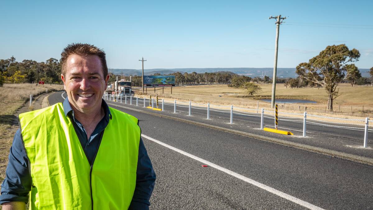 DOLLARS AND SENSE: Member for Bathurst Paul Toole, pictured at the scene of safety work at Mount Lambie, has reminded Oberon drivers to check their eligibility for a CTP Green Slip refund.