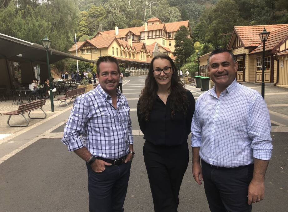 BOOST: Member for Bathurst Paul Toole, Jenolan Caves general manager Jodie Anderson and deputy premier John Barilaro.